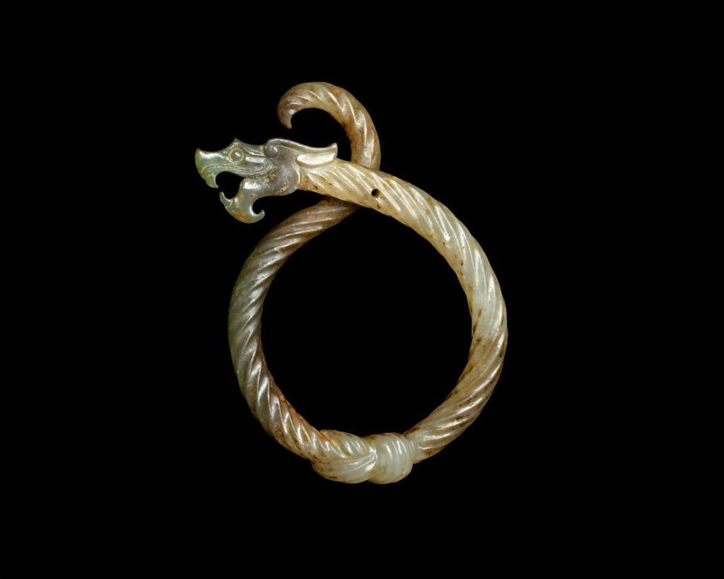A jade bracelet made in early china, estimated to be around 770-256 BCE.